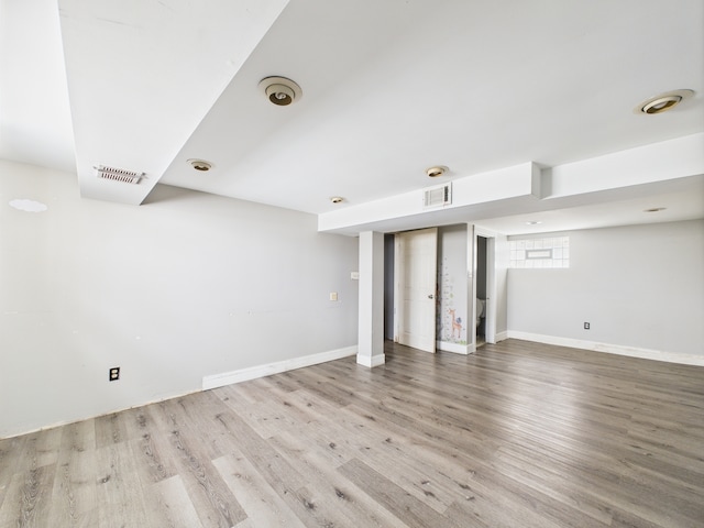 3810 W 71st St, Chicago, IL 60629 - below grade area with wood finished floors and baseboards