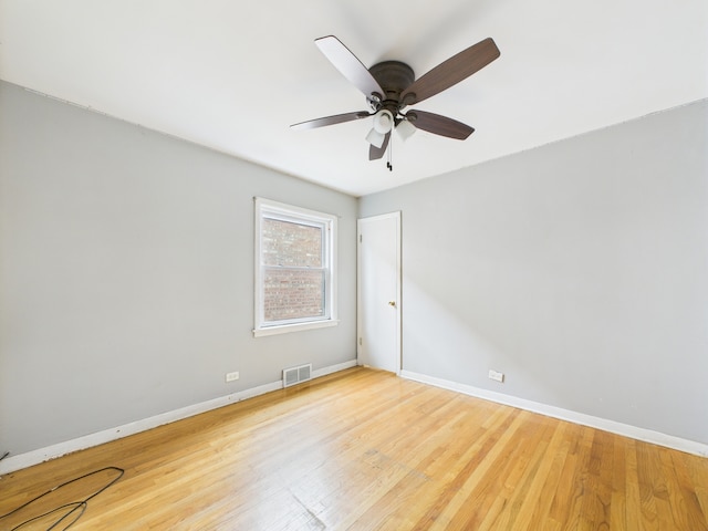 3810 W 71st St, Chicago, IL 60629 - unfurnished room with wood finished floors and ceiling fan