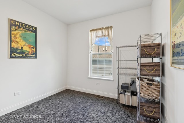 2032 Wentworth Dr, Volo, IL 60020 - unfurnished room with baseboards and dark carpet