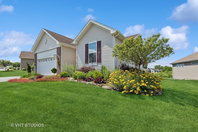2032 Wentworth Dr, Volo, IL 60020 - view of front of property with a front yard, an attached garage, and concrete driveway