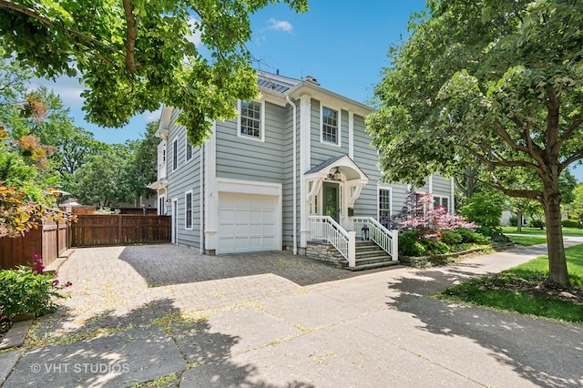 720 Willow Rd, Winnetka, IL 60093 - view of front of property with driveway and an attached garage
