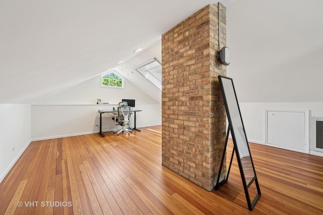 720 Willow Rd, Winnetka, IL 60093 - additional living space featuring hardwood / wood-style flooring, vaulted ceiling, and a desk