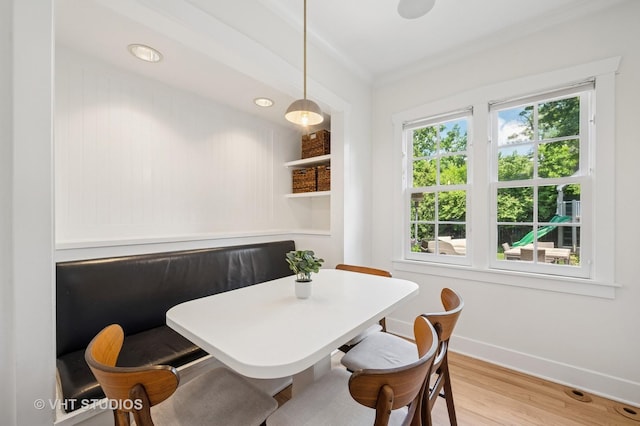 720 Willow Rd, Winnetka, IL 60093 - dining room featuring wood finished floors and ornamental molding