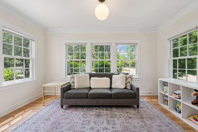 720 Willow Rd, Winnetka, IL 60093 - living area with healthy amount of natural light, crown molding, and wood finished floors