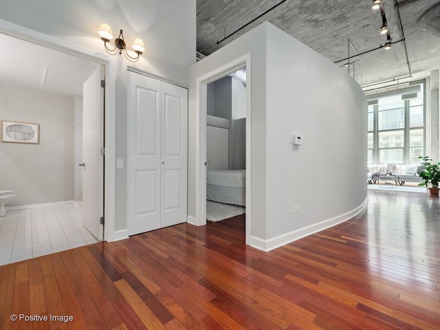900 N Kingsbury St Unit 967, Chicago, IL 60610 - unfurnished room with wood-type flooring and a chandelier