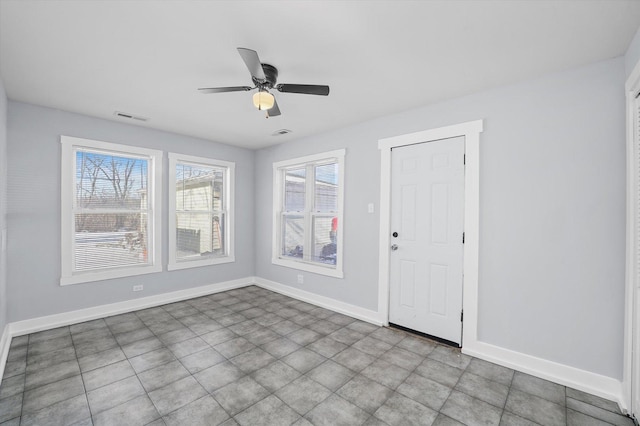 329 Blackhawk Dr, Park Forest, IL 60466 - spare room with baseboards and ceiling fan