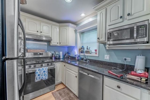 759 Norfolk Ave, Westchester, IL 60154 - kitchen with appliances with stainless steel finishes, under cabinet range hood, dark stone counters, recessed lighting, and light wood-style floors