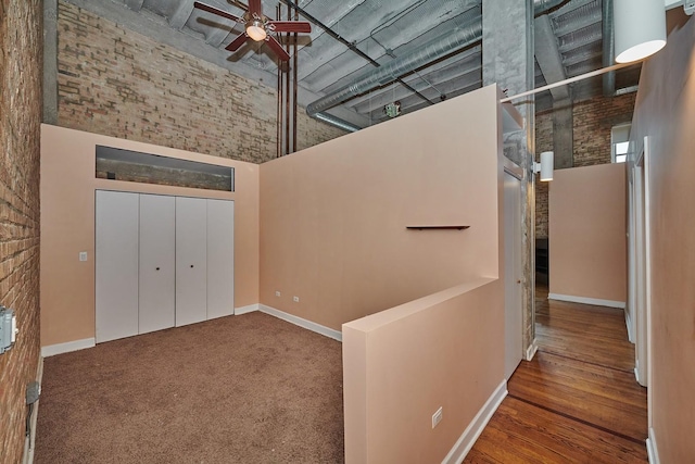 2545 S Dearborn St Unit 323, Chicago, IL 60616 - hall with a towering ceiling and baseboards