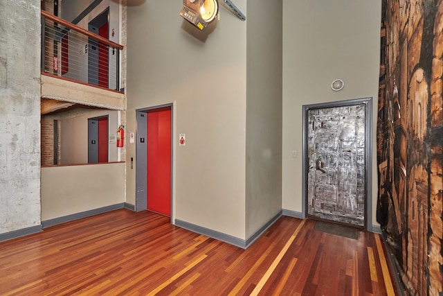 2545 S Dearborn St Unit 323, Chicago, IL 60616 - foyer featuring a high ceiling, wood finished floors, and elevator