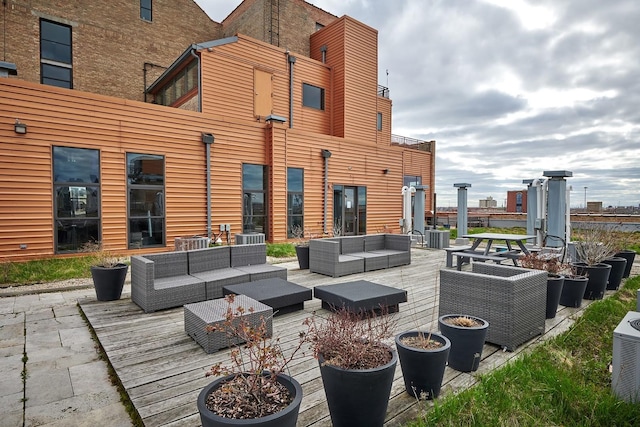 2545 S Dearborn St Unit 323, Chicago, IL 60616 - wooden deck with an outdoor hangout area