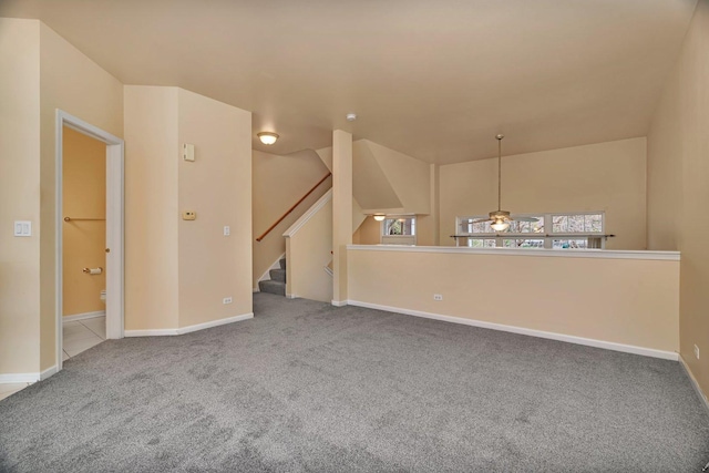 1109 Longwood Dr, Lisle, IL 60532 - unfurnished living room with carpet floors and baseboards