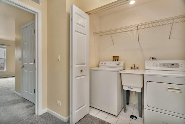 1109 Longwood Dr, Lisle, IL 60532 - laundry room with washer and clothes dryer and baseboards