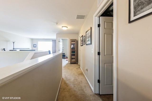 hall with light carpet