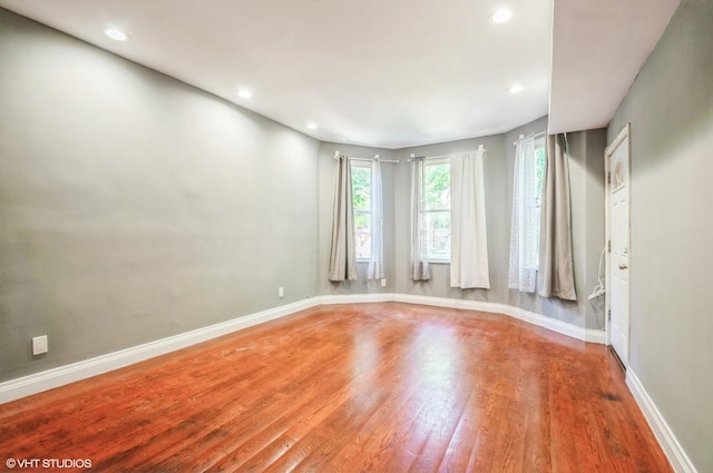 2939 N Springfield Ave, Chicago, IL 60618 - spare room featuring wood finished floors and recessed lighting