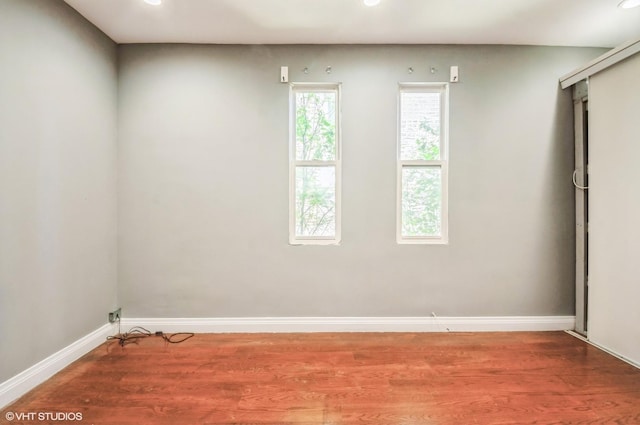 2939 N Springfield Ave, Chicago, IL 60618 - spare room with wood finished floors and recessed lighting