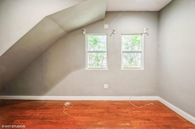 2939 N Springfield Ave, Chicago, IL 60618 - bonus room featuring wood finished floors and vaulted ceiling