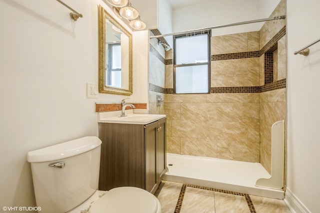 2939 N Springfield Ave, Chicago, IL 60618 - full bath featuring a tile shower, vanity, and tile patterned floors