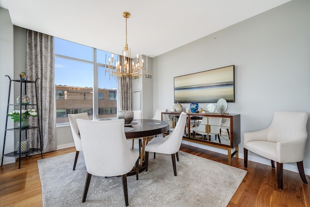 540 W Webster Ave Unit 611, Chicago, IL 60614 - dining space featuring a chandelier and wood finished floors