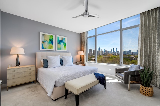 540 W Webster Ave Unit 611, Chicago, IL 60614 - bedroom with a view of skyline, light colored carpet, and ceiling fan