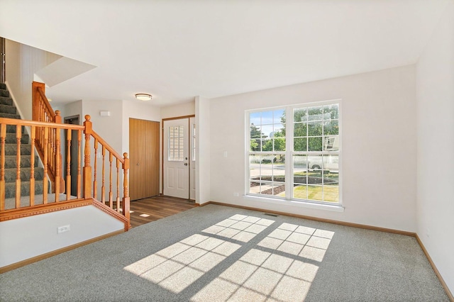 2315 Woodside Dr, Carpentersville, IL 60110 - carpeted entryway with stairs and baseboards