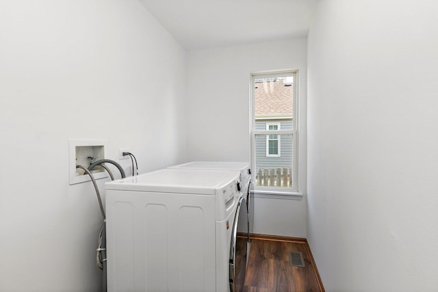 2315 Woodside Dr, Carpentersville, IL 60110 - laundry area featuring washing machine and clothes dryer and dark wood finished floors