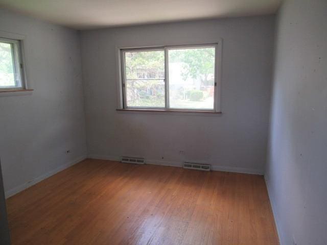 3636 Elm Ct, Flossmoor, IL 60422 - empty room with wood finished floors and baseboards