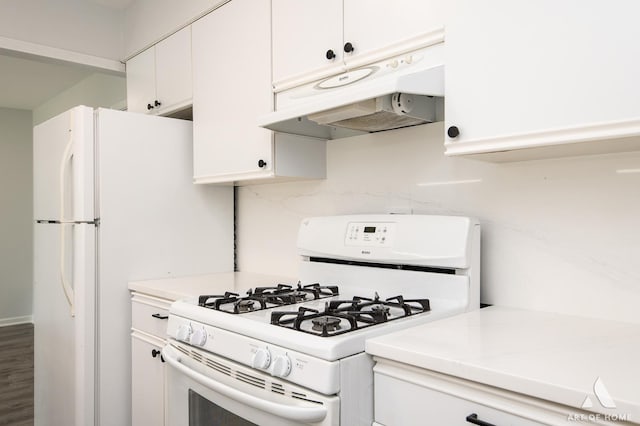 780 Buckingham Ct, Hoffman Estates, IL 60169 - kitchen featuring gas range gas stove, under cabinet range hood, light countertops, white cabinetry, and wood finished floors