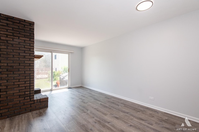 780 Buckingham Ct, Hoffman Estates, IL 60169 - empty room with wood finished floors and baseboards