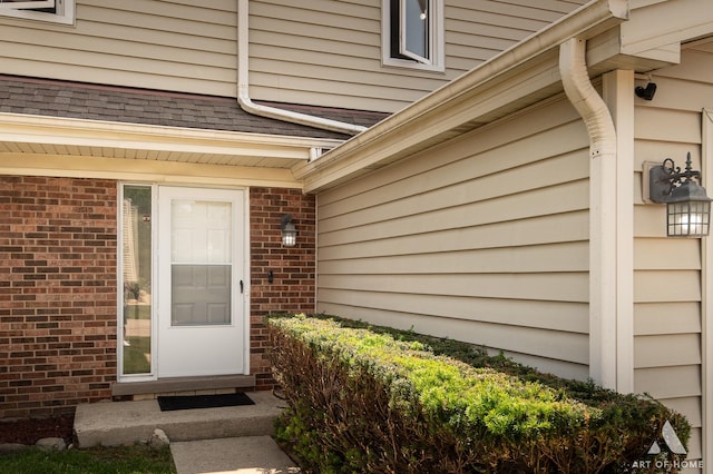 780 Buckingham Ct, Hoffman Estates, IL 60169 - doorway to property with brick siding