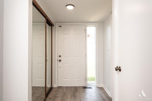 780 Buckingham Ct, Hoffman Estates, IL 60169 - foyer featuring wood finished floors and baseboards