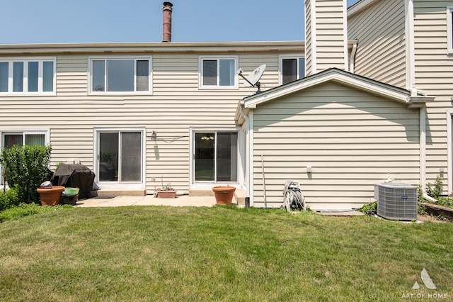 780 Buckingham Ct, Hoffman Estates, IL 60169 - back of house featuring a yard and a chimney