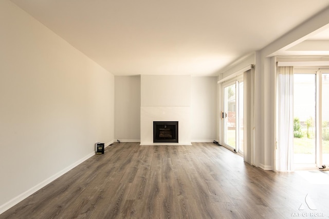 780 Buckingham Ct, Hoffman Estates, IL 60169 - unfurnished living room featuring dark wood-type flooring and a fireplace