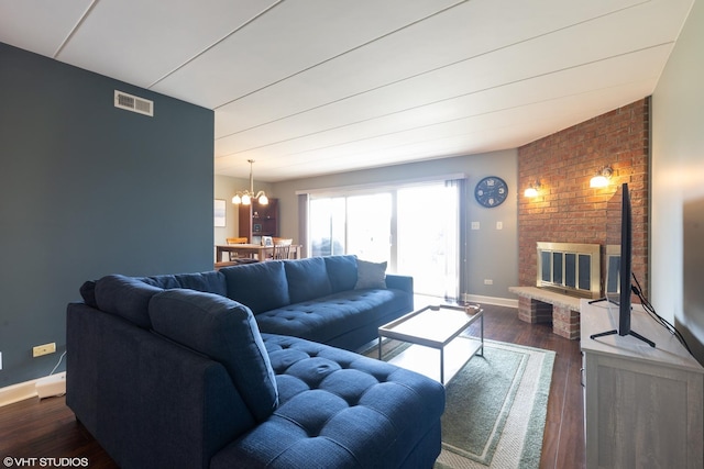 15722 Deerfield Ct Unit S-1, Orland Park, IL 60462 - living room with a chandelier, dark wood finished floors, and a fireplace