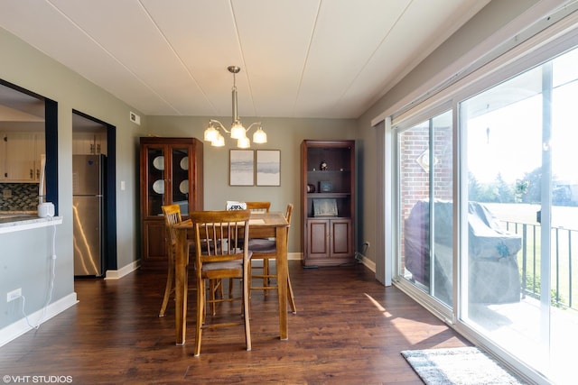 15722 Deerfield Ct Unit S-1, Orland Park, IL 60462 - dining room featuring dark wood finished floors and a chandelier