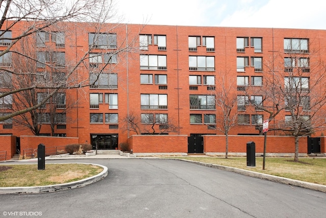 1169 S Plymouth Ct Unit 406, Chicago, IL 60605 - view of apartment building / complex featuring curved driveway