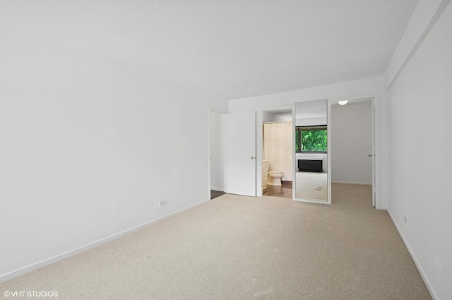 1169 S Plymouth Ct Unit 406, Chicago, IL 60605 - carpeted empty room featuring baseboards