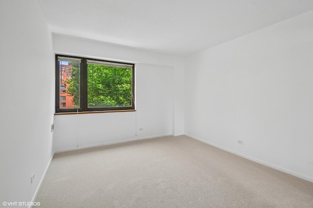 1169 S Plymouth Ct Unit 406, Chicago, IL 60605 - empty room with carpet floors