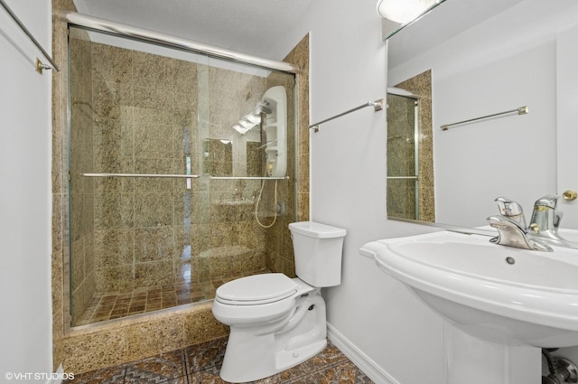 1169 S Plymouth Ct Unit 406, Chicago, IL 60605 - bathroom featuring toilet and a stall shower