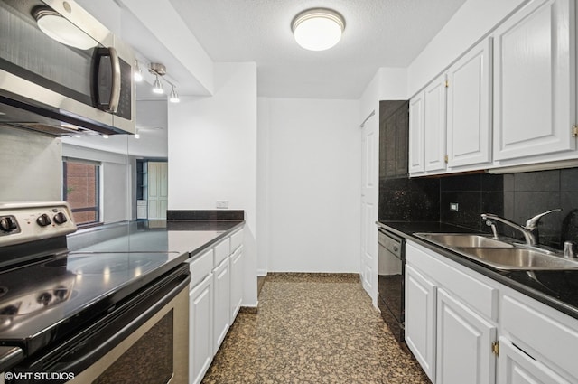 1169 S Plymouth Ct Unit 406, Chicago, IL 60605 - kitchen featuring stainless steel appliances, decorative backsplash, dark countertops, and white cabinets