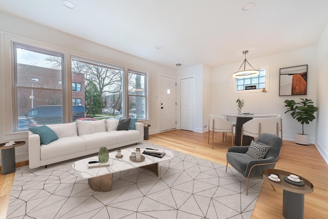 4634 N Hamlin Ave, Chicago, IL 60625 - living area featuring light wood-style flooring and plenty of natural light