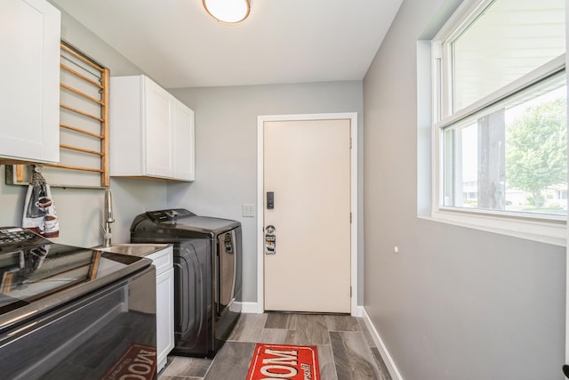 5705 Cobblestone Trl, Mchenry, IL 60050 - laundry area featuring cabinet space and washer and clothes dryer