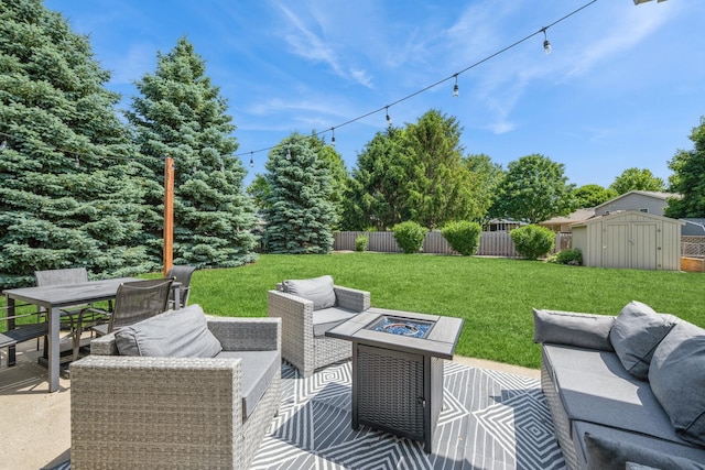 5705 Cobblestone Trl, Mchenry, IL 60050 - view of patio featuring a storage shed, outdoor dining space, and an outdoor living space with a fire pit