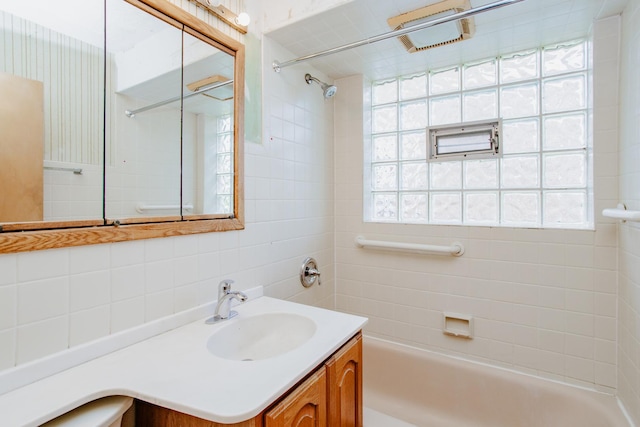 7320 N Oriole Ave, Chicago, IL 60631 - bathroom with vanity, bathtub / shower combination, healthy amount of natural light, and decorative backsplash