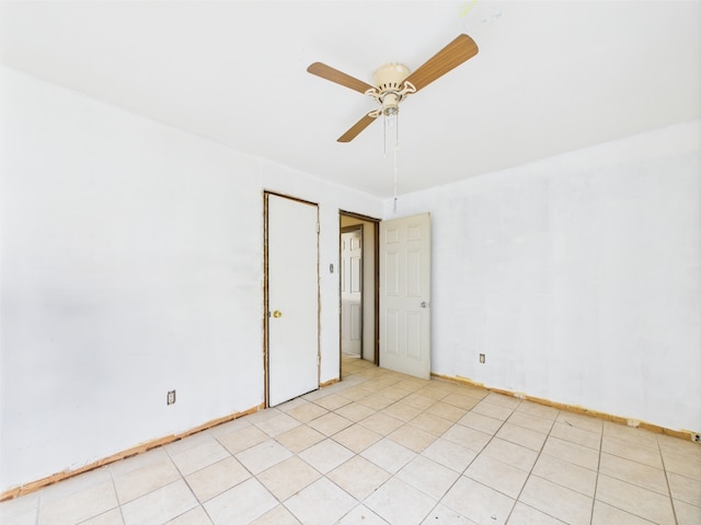 4931 S Knox Ave, Chicago, IL 60632 - empty room with a ceiling fan and baseboards