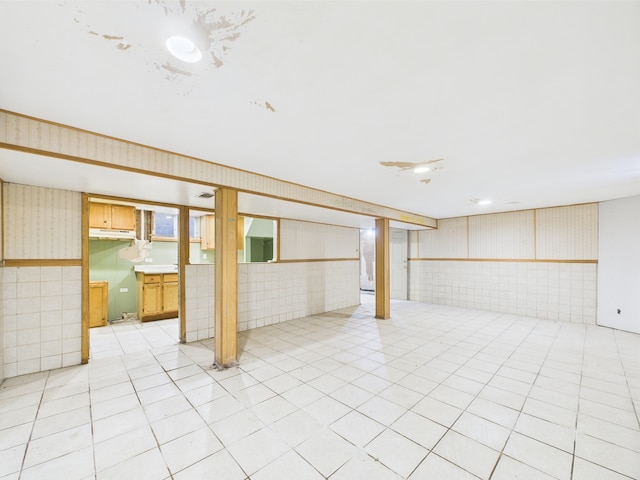 4931 S Knox Ave, Chicago, IL 60632 - finished basement with wallpapered walls and wainscoting