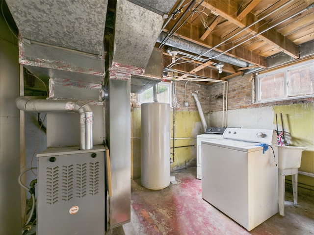4931 S Knox Ave, Chicago, IL 60632 - below grade area with water heater, healthy amount of natural light, and independent washer and dryer