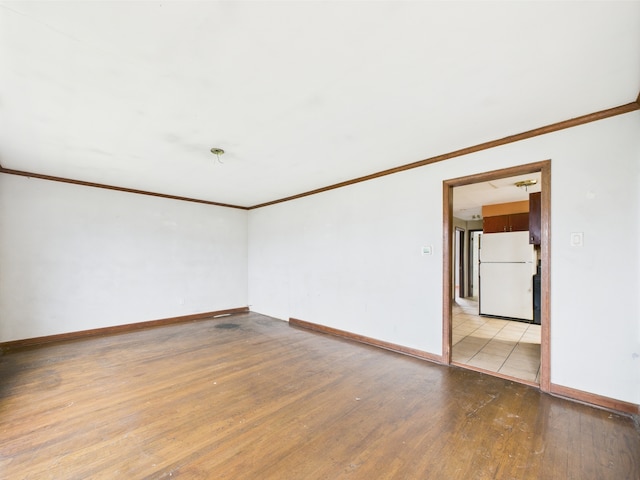 4931 S Knox Ave, Chicago, IL 60632 - spare room featuring crown molding and light wood-type flooring