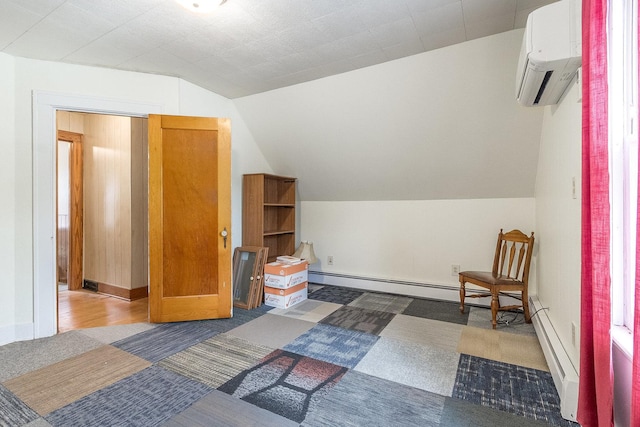 657 1st St, Crete, IL 60417 - bonus room with a wall mounted air conditioner, a baseboard heating unit, lofted ceiling, and carpet flooring