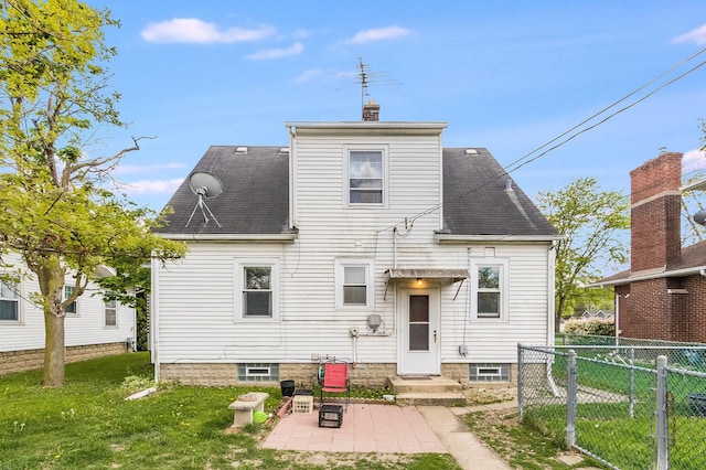 657 1st St, Crete, IL 60417 - rear view of property with a patio area, a chimney, a shingled roof, and entry steps