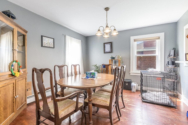 657 1st St, Crete, IL 60417 - dining room featuring wood finished floors, a chandelier, and a baseboard heating unit
